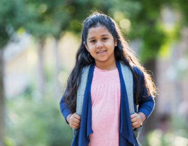 Girl with long hair and backpack